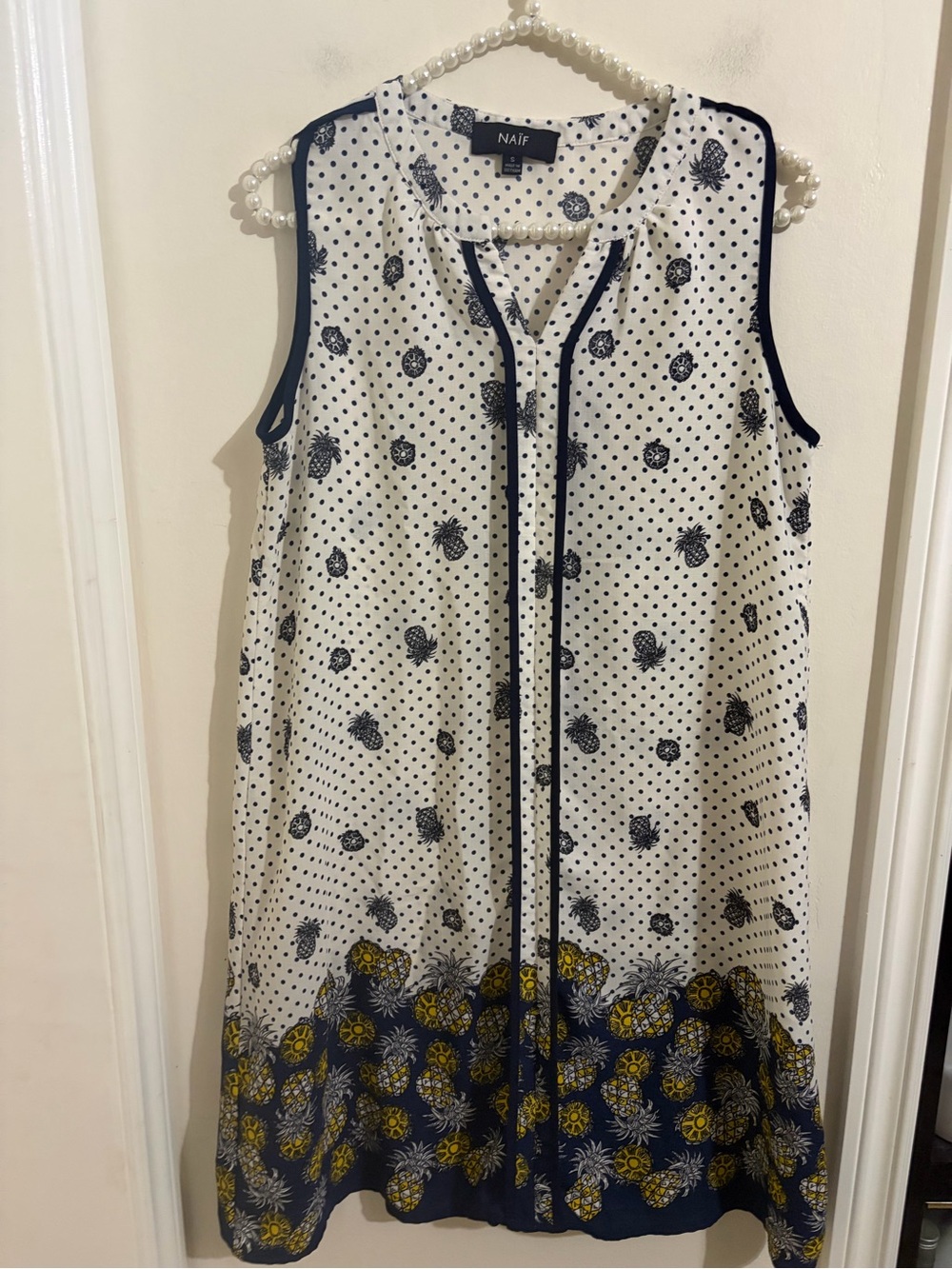 NAIF White and Navy Pineapple-Print Sleeveless Dress with Yellow Accents